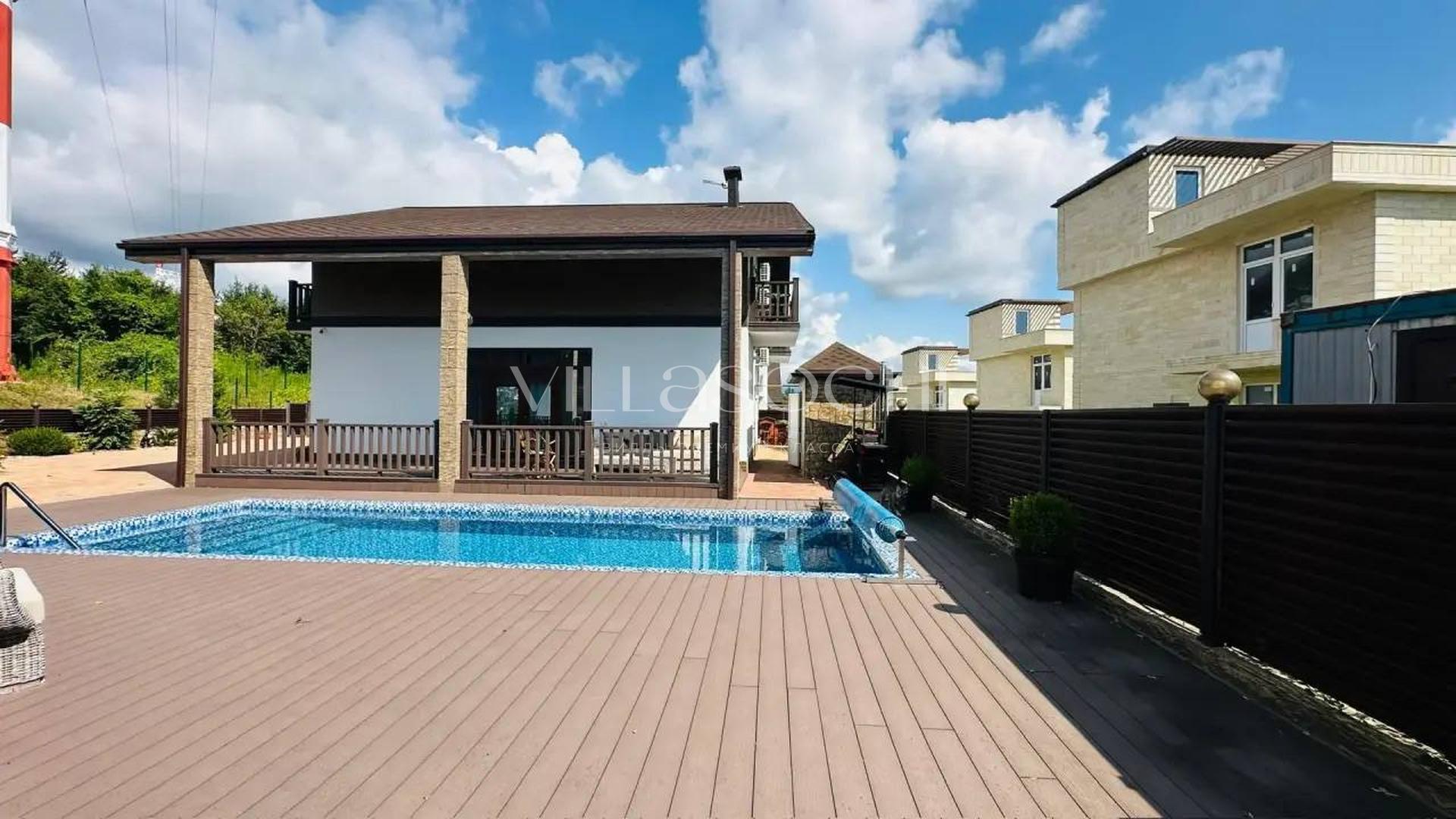 Фото №2. Дизайнерский дом 195 м² с бассейном, баней и видом на море