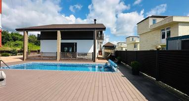 Фото №2. Дизайнерский дом 195 м² с бассейном, баней и видом на море